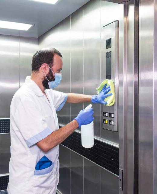 cleaning staff performing disinfection and hygiene work in hospital facilities